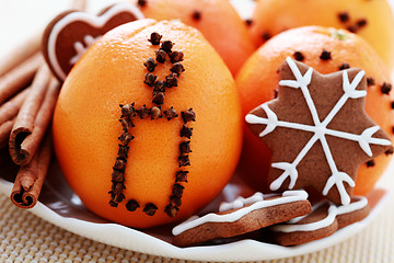 Image showing oranges and gingerbreads