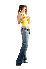 Image showing Young woman in wide jeans