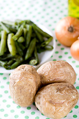 Image showing baked potatoes and french beans