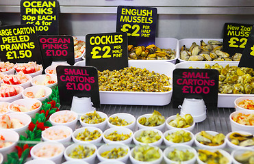 Image showing Cockles and mussels on sale