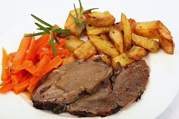 Image showing Plate of roast lamb