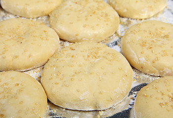 Image showing Dough rising for burger buns