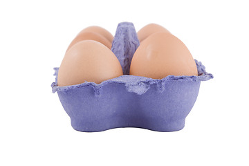 Image showing brown hens eggs in blue egg carton