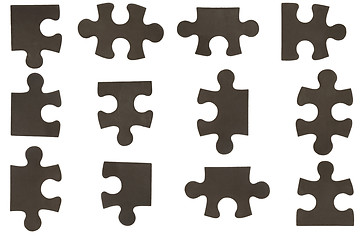 Image showing different black puzzle pieces