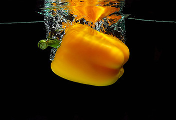 Image showing Pepper falling into water
