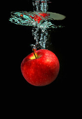 Image showing Apple falling into water