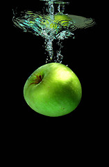 Image showing Apple falling into water