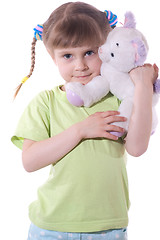 Image showing girl with a toy kitten