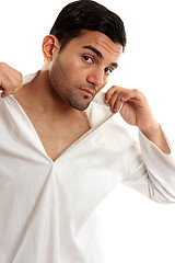 Image showing Man dressing or undressing