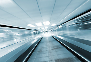 Image showing moving escalator in business center