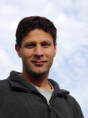 Image showing Young man against the blue sky