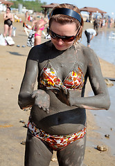 Image showing Applying Mud from the Dead Sea