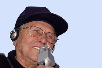 Image showing An old man singing