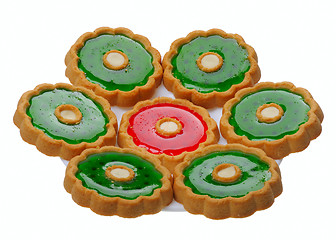 Image showing Cookies with red and green jelly on white plate, isolated