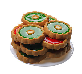 Image showing Cookies with red and green jelly on white plate, isolated