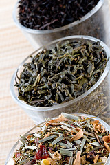 Image showing three kinds of dry tea in glasses