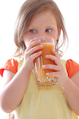 Image showing child drinking carrot juice