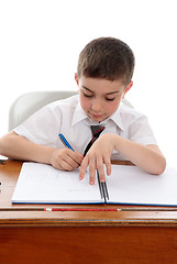 Image showing Studious boy doing school work