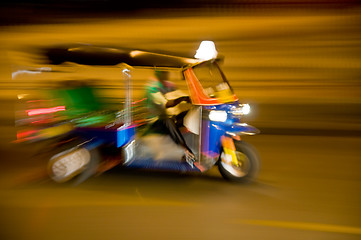 Image showing Blurred tuk-tuk taxi in Bangkok, Thailand