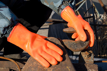 Image showing orange gloves