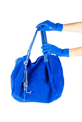 Image showing blue women bag at hand