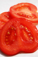 Image showing Juicy red tomato slices