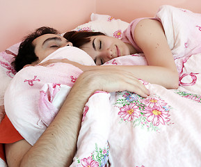 Image showing Young couple sleeping together.