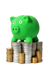 Image showing Green Piggy Bank and Coins