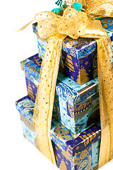 Image showing pyramid of blue gift boxes 