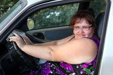 Image showing overweight woman behind the wheel