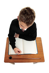 Image showing Conscientious school boy student