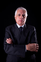 Image showing Portrait of a handsome mature businessman, thinking