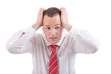 Image showing Strongly afflicted business man, with hands on head