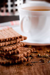 Image showing cup of herbal tea and some fresh cookies