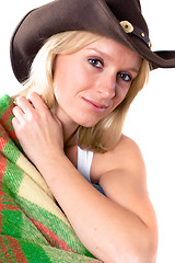 Image showing girl in a cowboy hat with wrapped in a plaid 