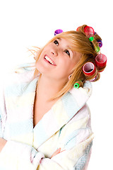 Image showing happy housewife with curlers