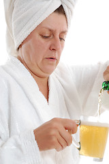 Image showing adult woman drinking beer