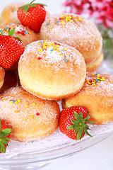 Image showing Berliner - doughnut filled with strawberry jam