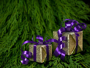 Image showing Christmas gifts on green background