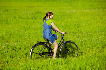 Image showing Riding a bicycle