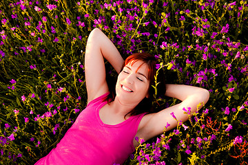 Image showing Lying on flowers