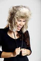 Image showing Girl with a fur hat