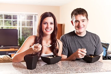 Image showing Couple eating breakfast