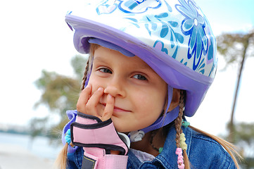 Image showing smiling child wearing protective helmet