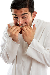 Image showing Man biting fingernails anxiety stress or terrified