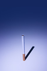 Image showing Isolated Cigarette Under Blue Light