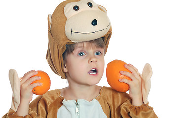 Image showing monkey child with oranges