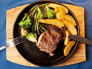 Image showing Fried meat and potatoes