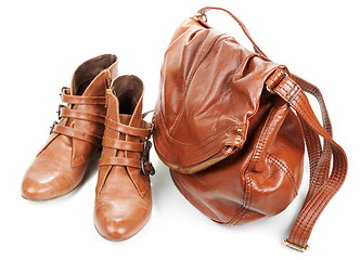 Image showing Brown leather bag and pair feminine boots