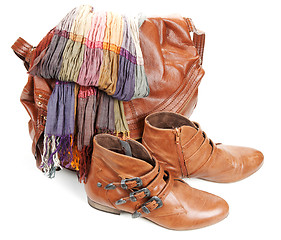 Image showing Brown leather bag, scarf and pair feminine boots